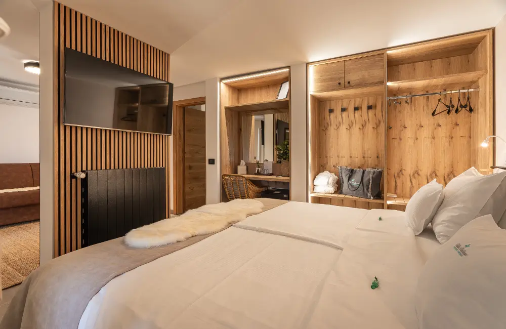 Tara Deluxe Suite bedroom with king bed, Villa Bellevue Portorož