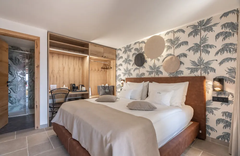 Shanti Deluxe Room bedroom with super king bed, Villa Bellevue Portorož